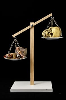 Skull and Money on a Two Pan Balance