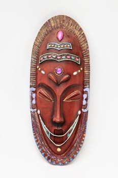 Wooden African Mask on a White Background