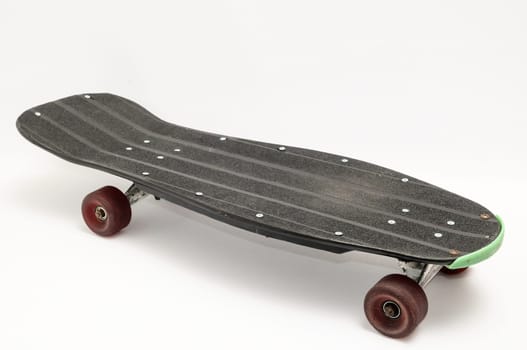 Vintage Style Black Skateboard on a white Background