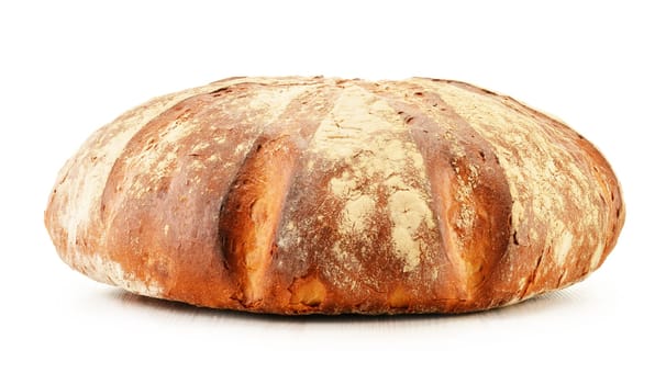 Large loaf of traditionally baked bread isolated on white