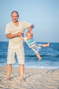 Baby and father having fun time