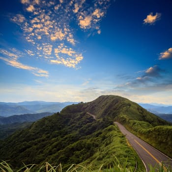 beautiful mountain road with nice sky for adv or others purpose use