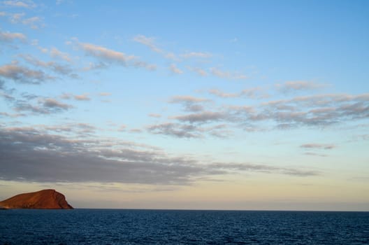 Cloudscape, Colored Clouds at Sunset near the Ocean