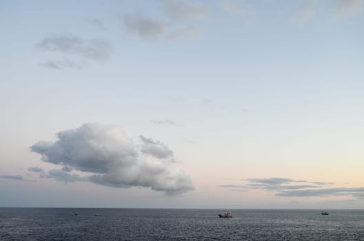 Cloudscape, Colored Clouds at Sunset near the Ocean