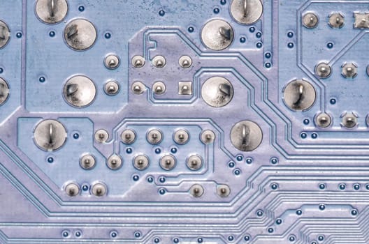 Macro Photo Of Electronic Circuit. Pcb On The Lighting.
