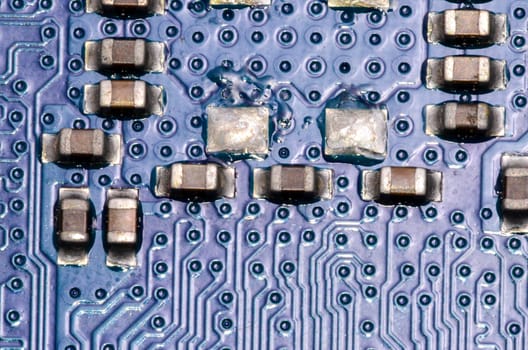 Macro Photo Of Electronic Circuit. Pcb On The Lighting.