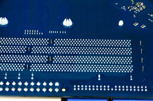 Macro Photo Of Electronic Circuit. Pcb On The Lighting.