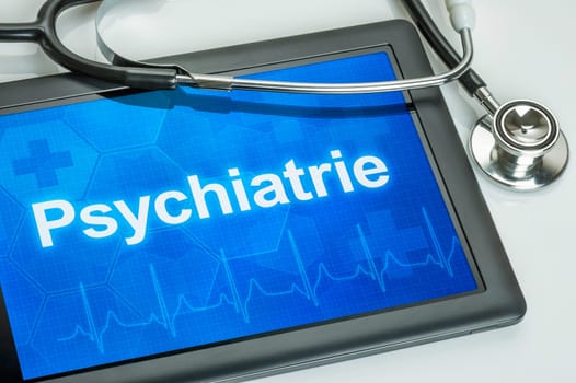 Tablet with the specialty psychiatry on display