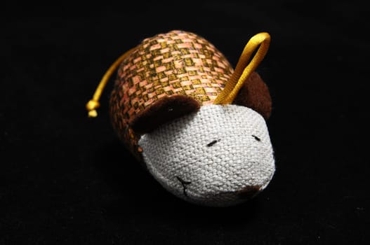 Toy Mouse Made of Cotton Cloth on a Black Background