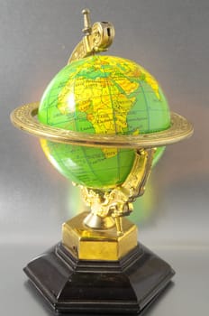 The Globe Planet Earth on a Colored Background