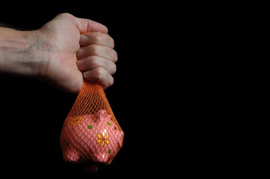 Trapped Money And an Hand on a Black Background