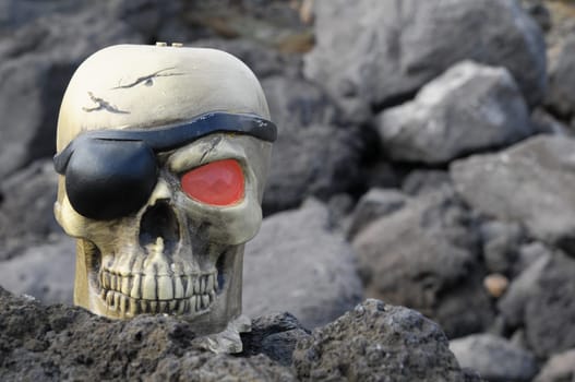 One Pirate Skull with a Red Eye and a Patch