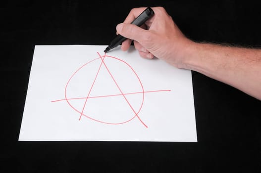 A Caucasian Male Hand Drawing on a White Paper