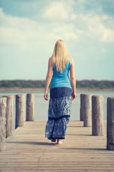 young woman at the lake