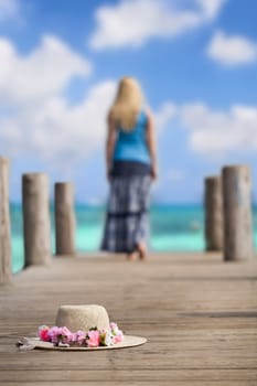 young woman runs on wooden walkway