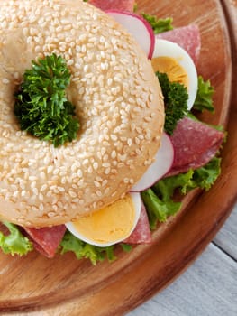 bagel with egg and salami