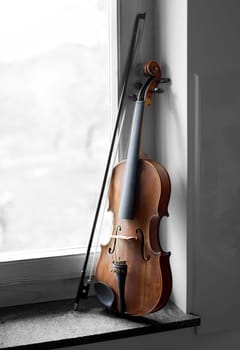 Violin beside window light close up shoot