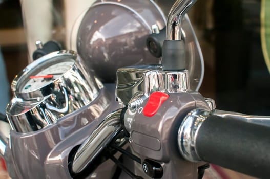 New classic scooter chromed handlebar detail closeup