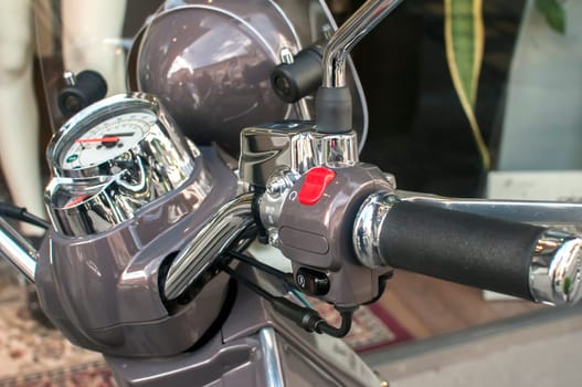 New classic scooter chromed handlebar detail closeup
