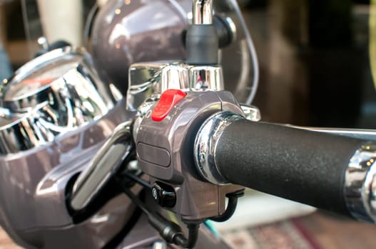New classic scooter chromed handlebar detail closeup