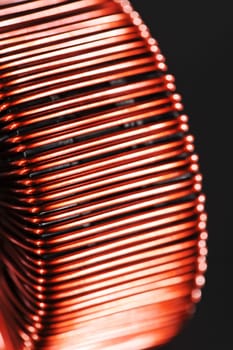 Macro detail of a transformer's copper coil