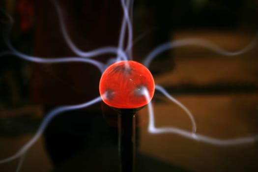 Plasma sphere with smooth magenta-blue flames
