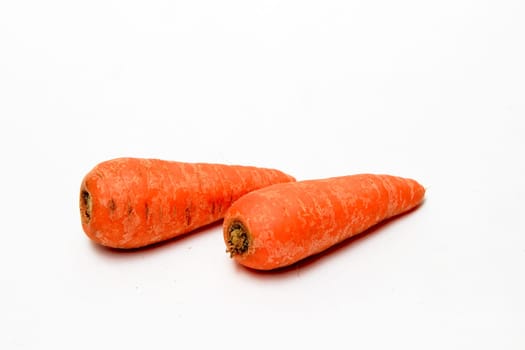 Healthful carrots, which are rich source of beta-carotene and fiber, isolated on white