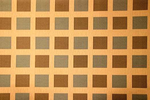 Neatly pressed, beautiful bed spread with square checkered pattern