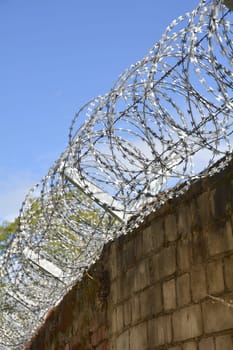 Barbed wire on a wall to protect against burglars
