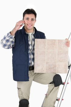 Tiler answering phone call from customer