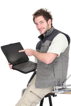 Tiler promoting his website