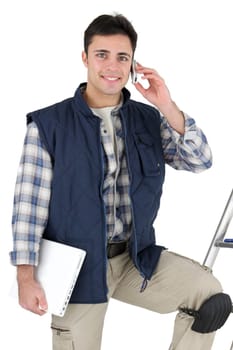 Tiler with mobile phone and equipment