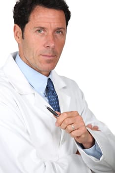 Male doctor with serious expression on face