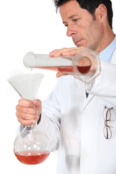 Man in laboratory conducting experiment