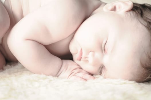 Close up of baby girls' sweet little head and face