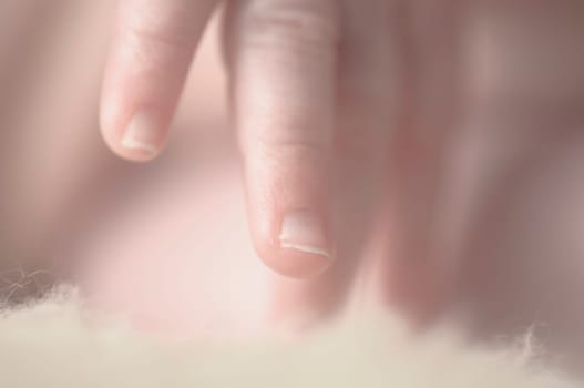 Close up of baby girls' sweet little hand and fingers