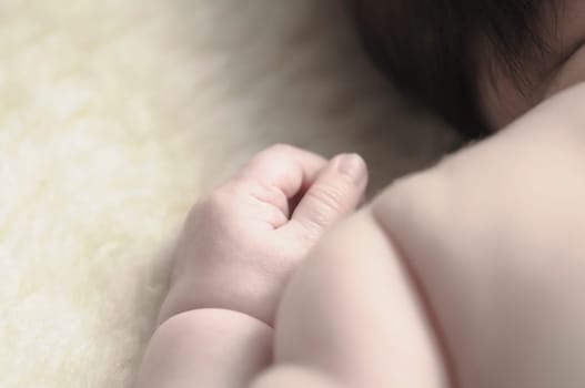 Close up of baby girls' sweet little hand and fingers