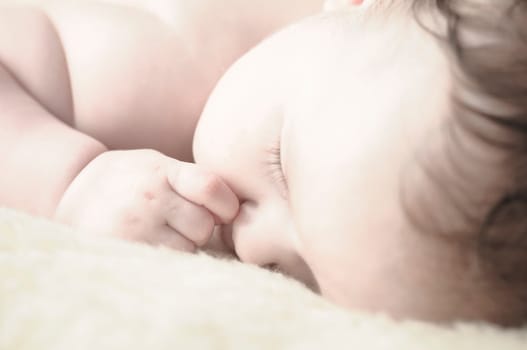 Close up of baby girls' sweet little head and face