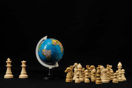 Globe And White Chess on a Black Background