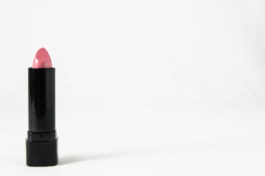 Lipstick in Black Container on a white background