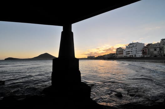 Sunset on the Atlantic Ocean with a Mountain in Background El Medano Tenerife Canary Islands Spain