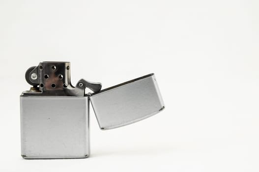 Vintage Zippo Style Lighter On a White Background