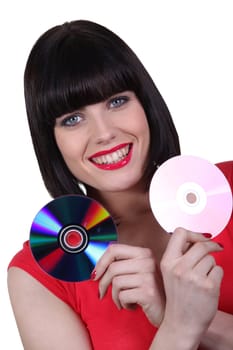 Woman with two CDs