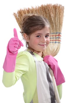 Little girl with broom