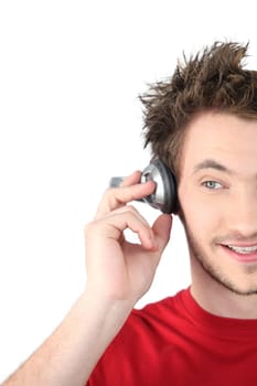 Man listening to music through headphones
