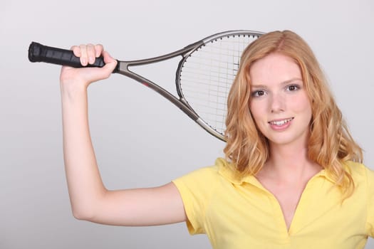 Woman with tennis racket
