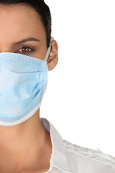 Young woman in a surgical mask