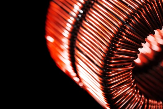 Macro detail of two copper coils of a transformer