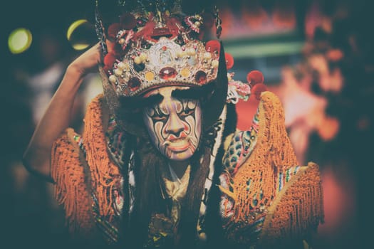 New Taipei City, Taiwan - October 1, 2011: Disciples play Infernal Generals in the parade (Editorial Use Only)