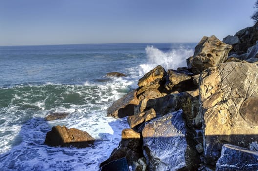 Rocks in the ocean, close to Getaria city in Spain
